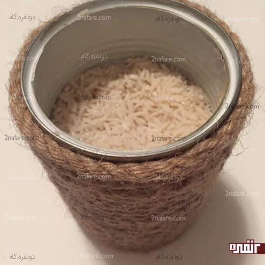 پر کردن قوطی با برنج