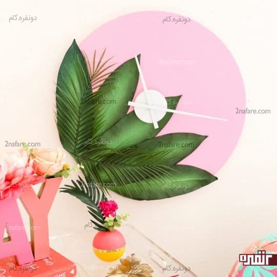 ساعت دیواری ساده ی چوبی با تزیین برگ