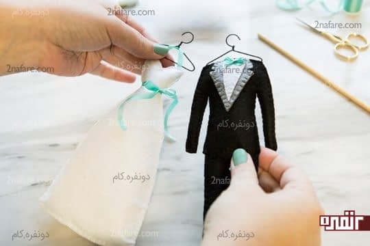 آماده شده ی لباس عروس و داماد نمدی