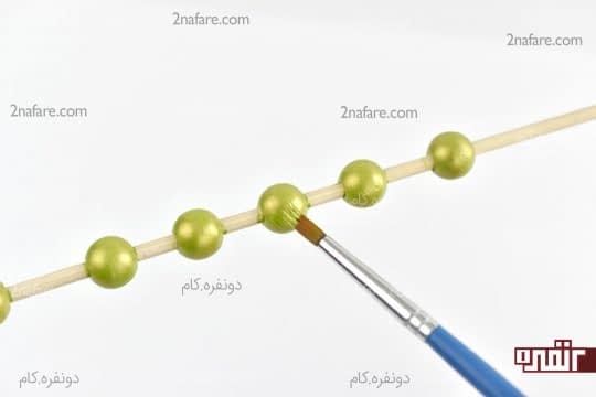 رنگ آمیزی مهره های چوبی