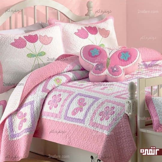 روتختی صورتی رنگ با کوسن های فانتزی به شکل گل و پروانه