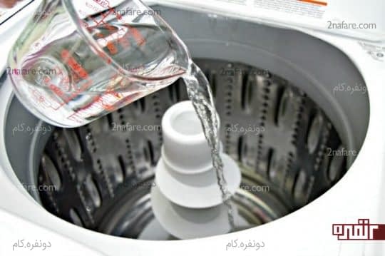 ریختن سرکه در ماشین لباسشویی به منظور ضدعفونی کردن