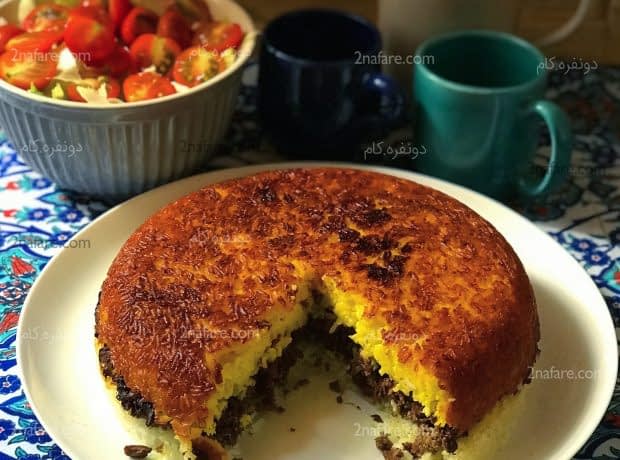 طرز تهیه پلو لایه ای گوشت و کشمش مرحله به مرحله پلو لایه ای گوشت و کشمش
