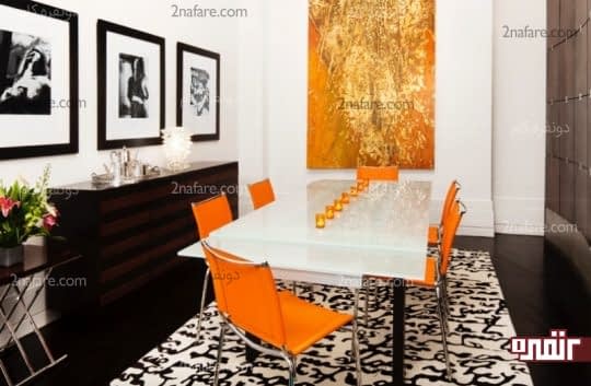 اتاق غذاخوری با تابلو و صندلی های نارنجی رن
