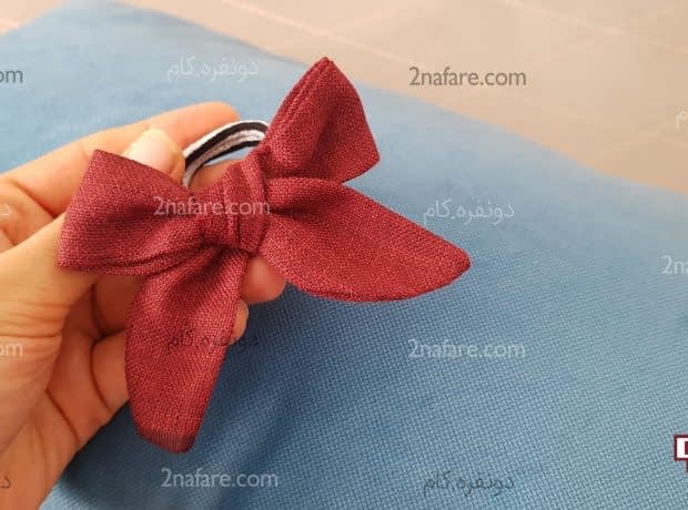 تزیین کش مو با پاپیون پارچه ای کش تزیین شده
