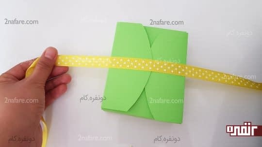 گذاشتن ربان روی جعبه